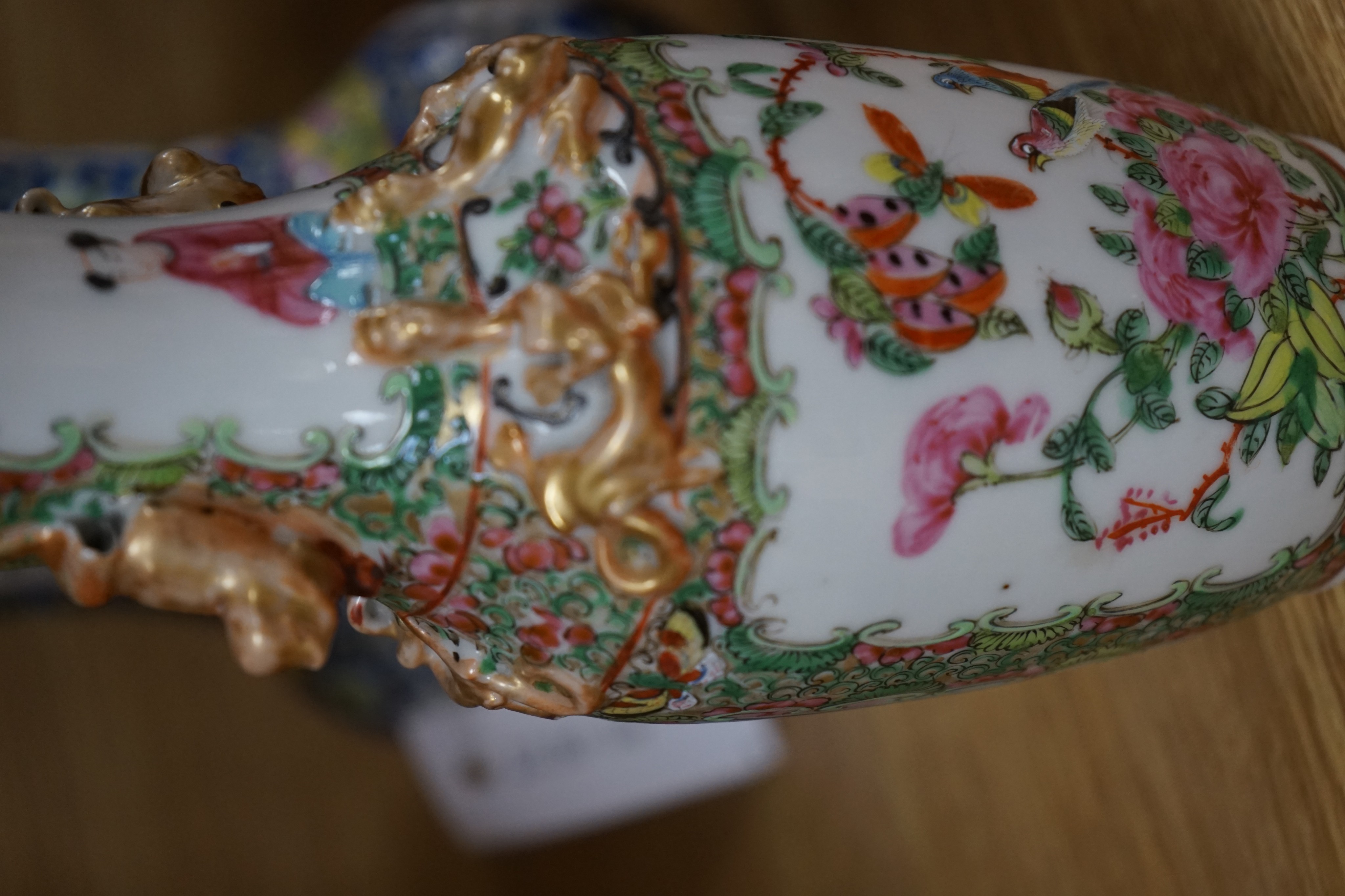Four 19th century Chinese famille rose vases, 21cm